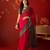 Rani silk cotton printed saree with unstitched blouse piece.