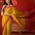 Yellow silk cotton printed saree with unstitched blouse piece.