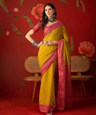 Yellow silk cotton printed saree with unstitched blouse piece. 2