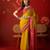 Yellow silk cotton printed saree with unstitched blouse piece.