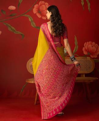 Yellow silk cotton printed saree with unstitched blouse piece. 3