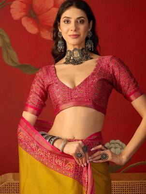 Yellow silk cotton printed saree with unstitched blouse piece. 5
