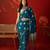 Teal silk cotton bandhni printed saree with unstitched blouse piece.