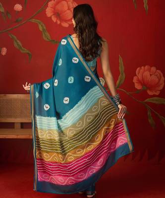Teal silk cotton bandhni printed saree with unstitched blouse piece. 3