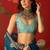 Teal silk cotton bandhni printed saree with unstitched blouse piece.