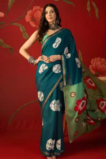 Rama silk cotton bandhni printed saree with unstitched blouse piece.