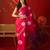 Rani silk cotton bandhni printed saree with unstitched blouse piece.