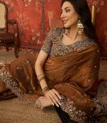 Brown tissue satin embroidered saree with unstitched blouse piece.