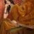 Gold tissue satin embroidered saree with unstitched blouse piece.