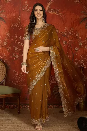 Gold tissue satin embroidered saree with unstitched blouse piece.