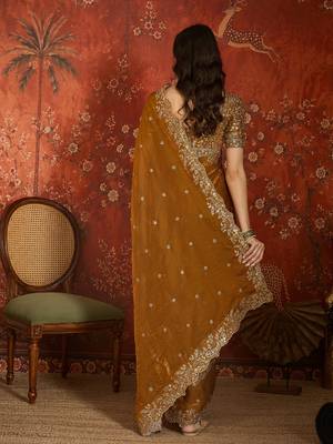 Gold tissue satin embroidered saree with unstitched blouse piece. 4
