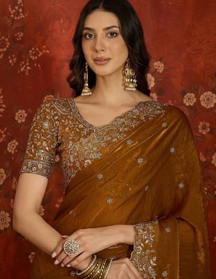 Gold tissue satin embroidered saree with unstitched blouse piece. 5