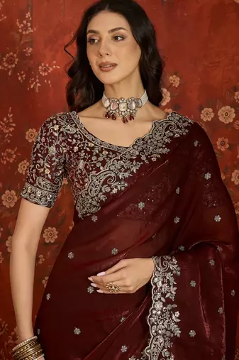 Maroon tissue satin embroidered saree with unstitched blouse piece.