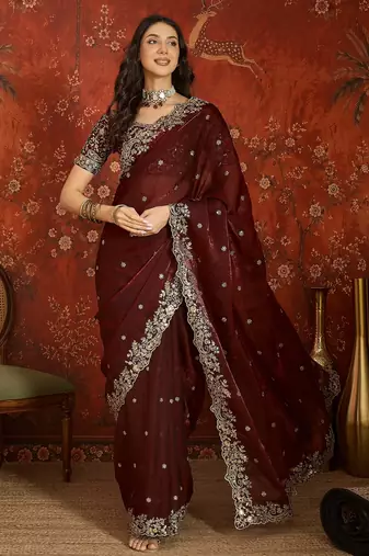 Maroon tissue satin embroidered saree with unstitched blouse piece.