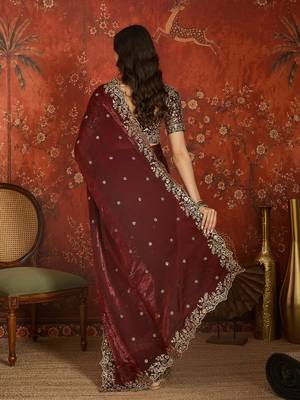 Maroon tissue satin embroidered saree with unstitched blouse piece. 5