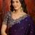 Purple tissue satin embroidered saree with unstitched blouse piece.