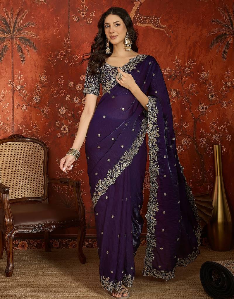 Purple tissue satin embroidered saree with unstitched blouse piece.