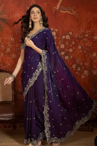 Purple tissue satin embroidered saree with unstitched blouse piece.