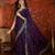 Purple tissue satin embroidered saree with unstitched blouse piece.