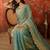 Sky blue tissue satin embroidered saree with unstitched blouse piece.