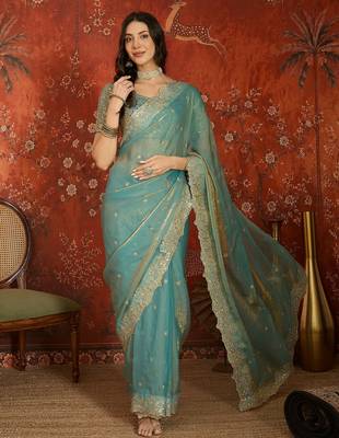 Sky blue tissue satin embroidered saree with unstitched blouse piece. 2