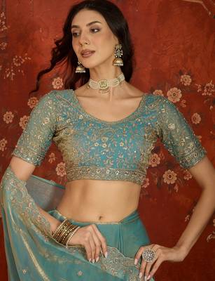 Sky blue tissue satin embroidered saree with unstitched blouse piece. 3