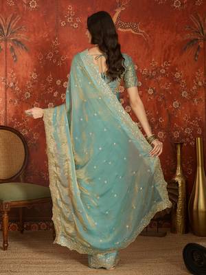Sky blue tissue satin embroidered saree with unstitched blouse piece. 4