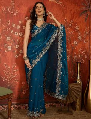 Teal tissue satin embroidered saree with unstitched blouse piece. 2