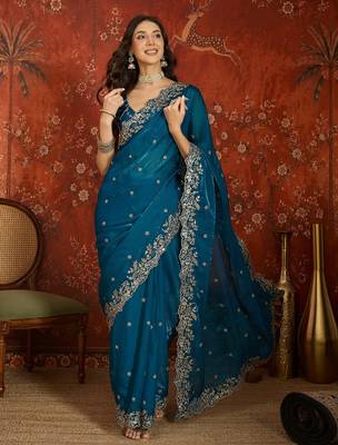 Teal tissue satin embroidered saree with unstitched blouse piece. 4