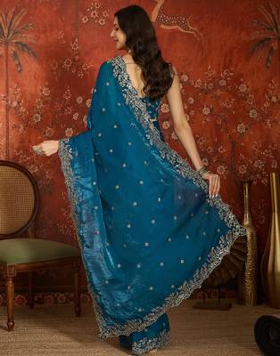 Teal tissue satin embroidered saree with unstitched blouse piece. 5