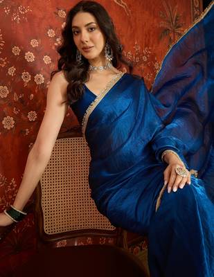 Teal tissue satin sequins saree with unstitched blouse piece. 1