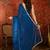Teal tissue satin sequins saree with unstitched blouse piece.