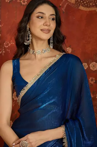 Teal tissue satin sequins saree with unstitched blouse piece