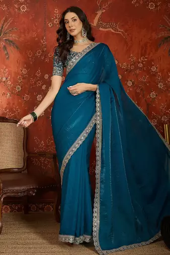 Teal tissue satin embroidered saree with unstitched blouse piece.