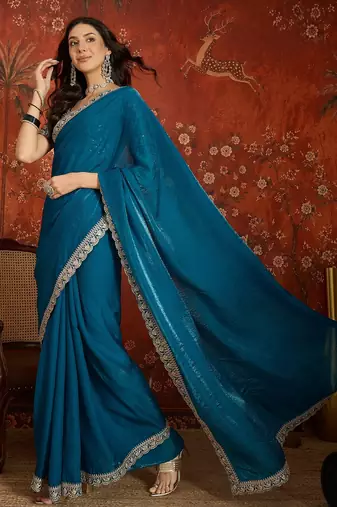 Teal tissue satin embroidered saree with unstitched blouse piece.