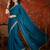 Teal tissue satin embroidered saree with unstitched blouse piece.