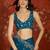 Teal tissue satin embroidered saree with unstitched blouse piece.