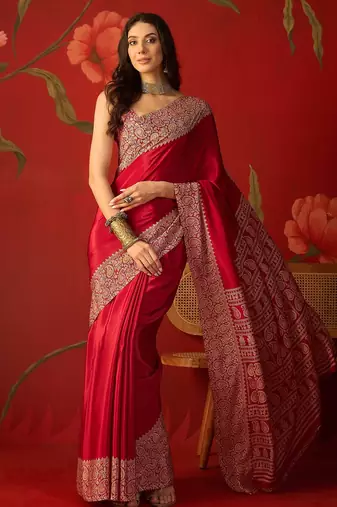 Red silk blend crepe printed saree with unstitched blouse piece.