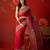 Red silk blend crepe printed saree with unstitched blouse piece.