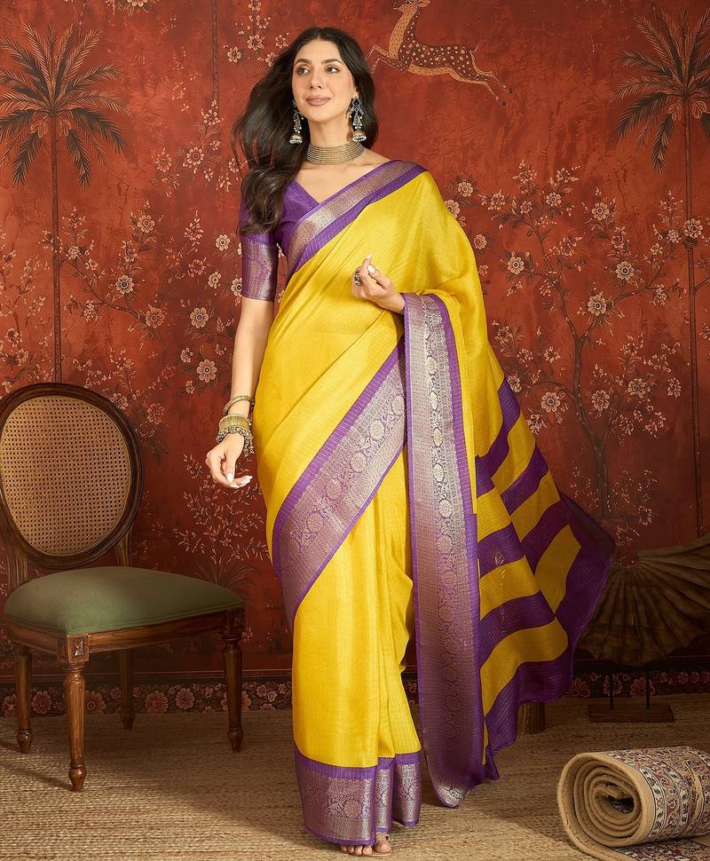Yellow silk cotton zari saree with unstitched blouse piece.