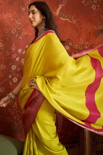 Yellow silk cotton zari saree with unstitched blouse piece.