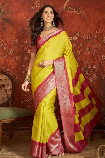 Yellow silk cotton zari saree with unstitched blouse piece.