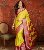 Yellow silk cotton zari saree with unstitched blouse piece.