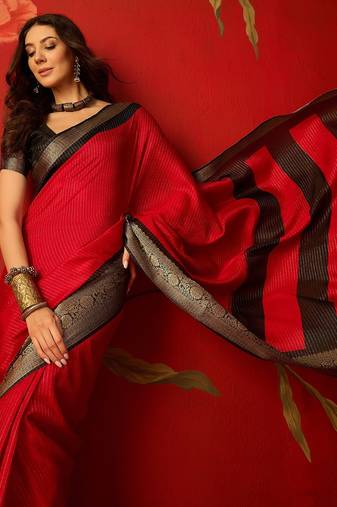Red silk cotton zari saree with unstitched blouse piece.