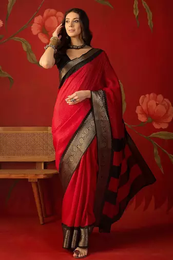Red silk cotton zari saree with unstitched blouse piece.