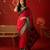 Red silk cotton zari saree with unstitched blouse piece.
