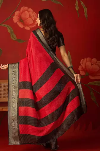 Red silk cotton zari saree with unstitched blouse piece.