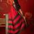 Red silk cotton zari saree with unstitched blouse piece.