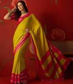 Neon silk cotton zari checks saree with unstitched blouse piece.