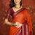 Orange silk cotton zari checks saree with unstitched blouse piece.